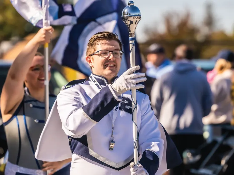 Marching band outdoors during Homecoming.